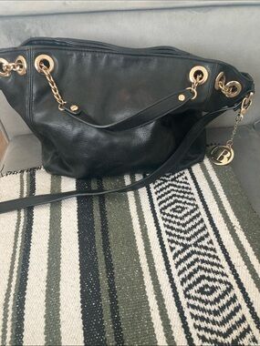Black Leather Shoulder Bag with Gold Chain Accents